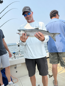 Huge 63-inch Chinook reeled in during a perfect day of light tackle trolling!