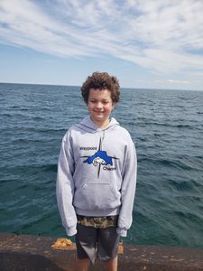 A person cruising and fishing in the Knife River