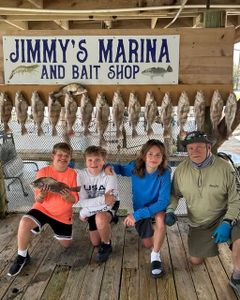 Black drum fishing success at Jimmy's Marina and Bait Shop in Port Isabel TX with multiple fish displayed