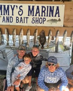 Fishing catch display showing California Flounder and American Eel from Port Isabel TX at Jimmy's Marina and Bait Shop