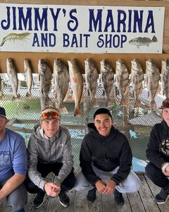 Successful redfish fishing trip display at Jimmy's Marina and Bait Shop in Port Isabel TX