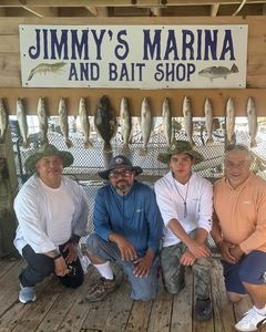 Fishing group at Jimmy's Marina and Bait Shop in Port Isabel TX with Southern Kingcroaker catch