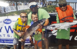 Two king mackerel in the water at Jacksonville Beach