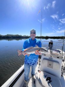 A person fishing for a single redfish in Crystal River