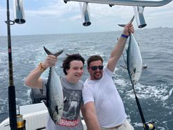 Happy Anglers With Their Catch Little Tunny