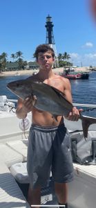A person fishing at Pompano Beach