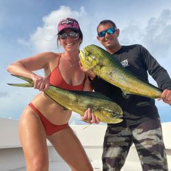Two fishermen with their catch at Pompano Beach