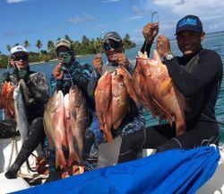 A group of 4 people fishing in PR