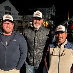 Three people on a cruises and fishing adventure in NC