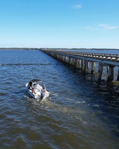 Person enjoying cruises and fishing in NC