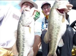 Two anglers fishing for largemouth bass in Tennessee