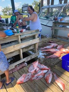 Two people fishing in Biloxi