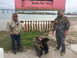 Three people fishing in TX