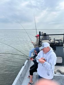 Two people fishing in TX