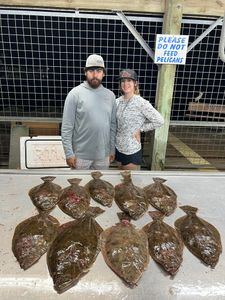 Four European flounder fish caught in Matagorda, Texas