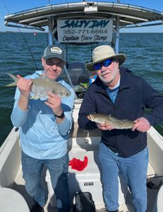 Two anglers fishing in the waters of Hernando