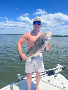A person fishing in Florida