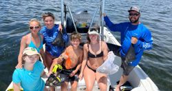 A group of 6 people enjoying a fishing trip in Hernando