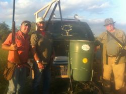 Three people fishing and hunting in Port Isabel
