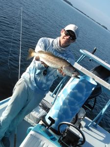 Photo of a spotted weakfish, a 20-inch fishing catch, in Port Isabel