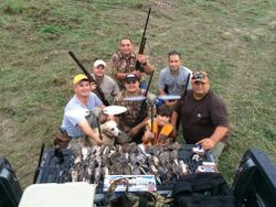 Seven people enjoying a fishing and hunting adventure at Port Isabel