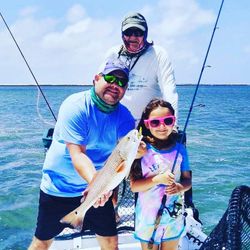 Two people fishing in TX