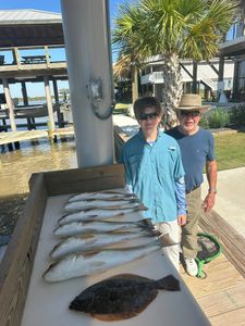 2 summer flounder fish caught while fishing in Matagorda
