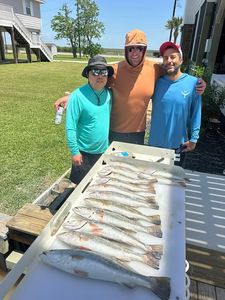 Fresh caught fish displayed on cleaning table after successful fishing trip in Matagorda TX