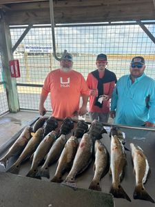 Two redfish caught during a fishing and hunting adventure in Matagorda