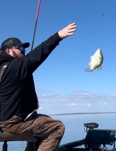 One fisherman with rod and reel fishing in Cleveland