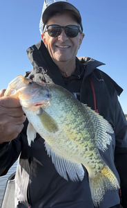Great day jigging in Oklahoma with clear skies - perfect conditions for an exciting catch!