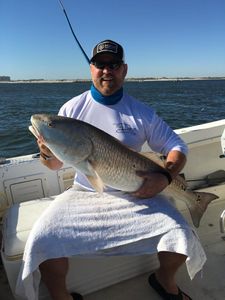 A person fishing in FL