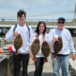 Four Southern Flounder and Summer Flounder caught while fishing in Longport, New Jersey