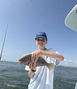 Person fishing in Longport