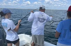 Angler enjoying fishing tour in Longport