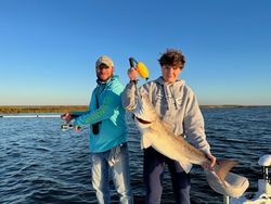 On the water with a perfect catch.
