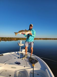 Catching Redfish and chasing sunsets.
