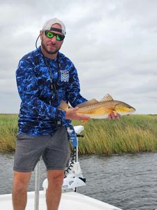 Capt.  Jason caught this beautiful lil Redfish 1st cast of the day on a scouting trip 