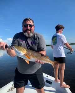 A pair of people fishing in Florida
