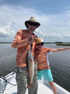 Angler holding a redfish in Florida