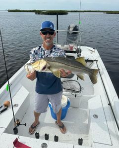 A person fishing for a snook in Spring Hill