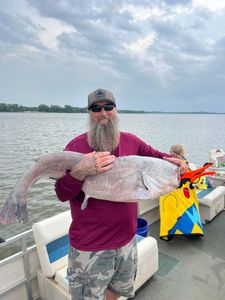 Two anglers enjoying a fishing trip in Norman