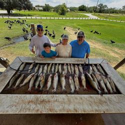 4 people fishing in TX