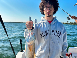 A fisherman with a redfish catch in TX