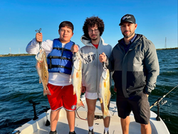 3 unknown fish being caught in Elmendorf