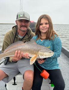 She landed her PB Redfish at 27" at 10 years old