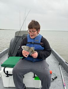 First time holding a fish while drumming