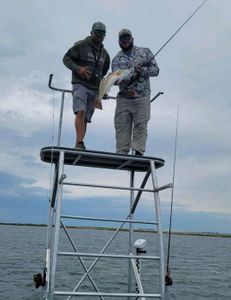 Two people fishing in Rockport
