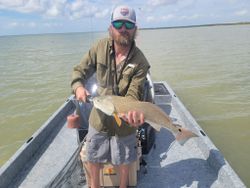 A person fishing in Rockport