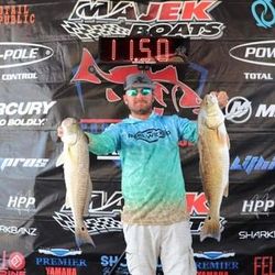 Angler holding two big fish in Rockport
